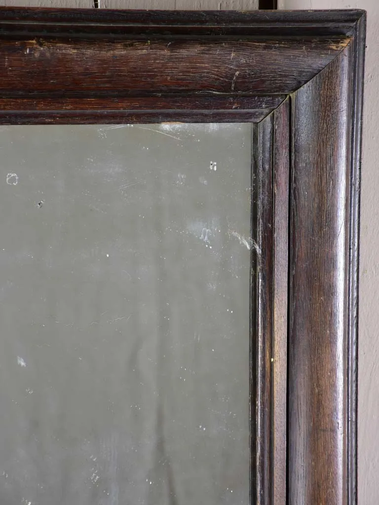 Late 19th Century French mirror with dark timber frame 22¾" x 28¼"