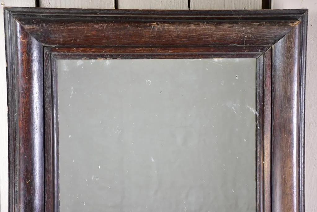 Late 19th Century French mirror with dark timber frame 22¾" x 28¼"